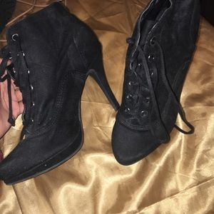 Women’s laced up black heels size 9